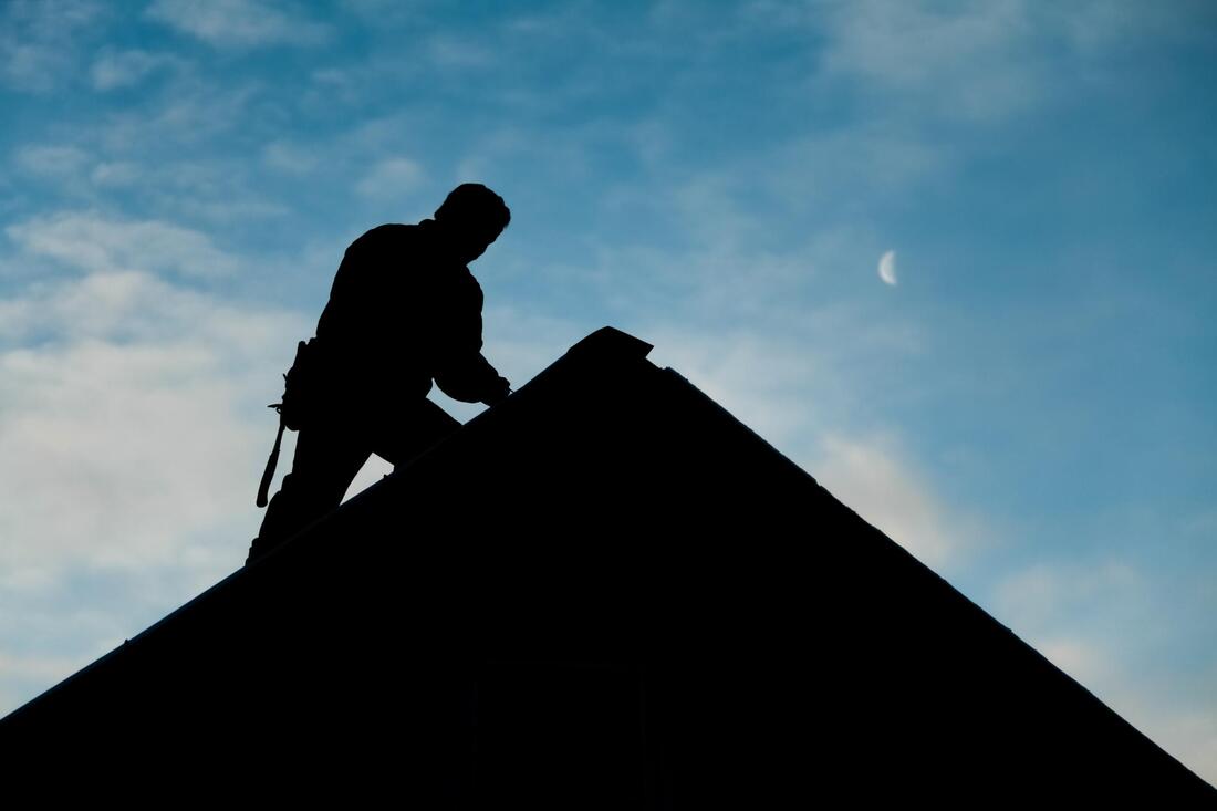 worker in the roof